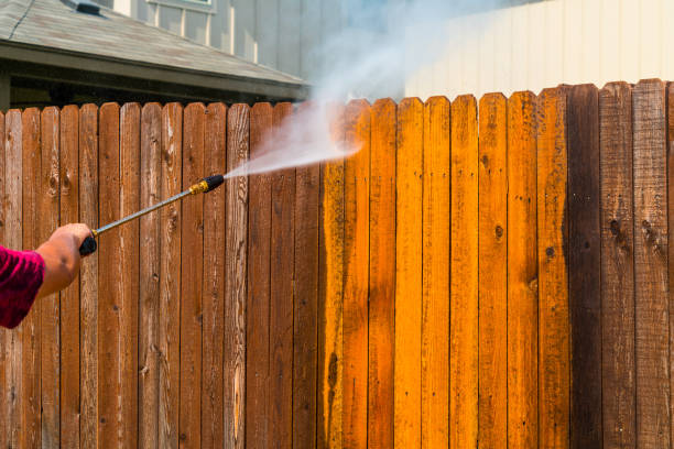 Pressure Washing Wooden Fence Pressure Washing Wooden Fence residential preasure cleaning stock pictures, royalty-free photos & images